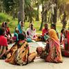 Women from a village in the state of Bihar, India, get together for a community meeting. 