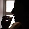 A woman living with HIV takes antiretroviral medication at home in Khatlon, Tajikistan.