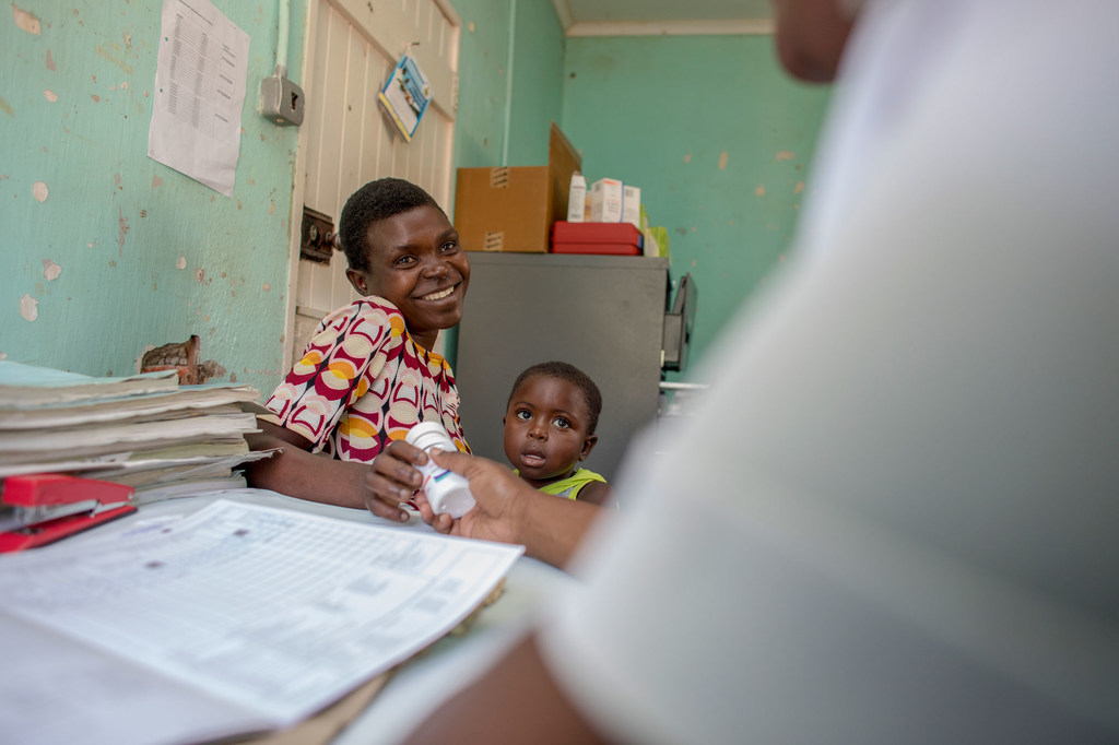A woman living with HIV receives medication at a hospital in Zimbabwe.