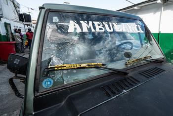 An ambulance at the General Hospital in Port-au-Prince shows signs of being attacked.