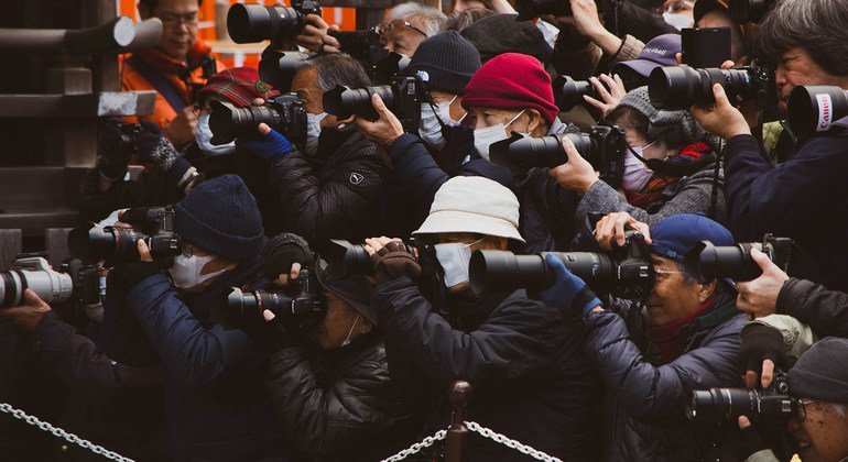 Press gather at an event in Shanghai, China.
