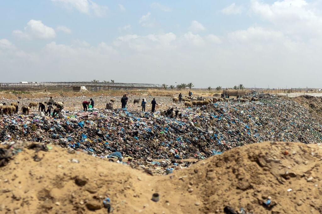Displaced families are living in overcrowded tents and makeshift shelters, surrounded by waste and debris, with limited access to safe water and sanitation services.