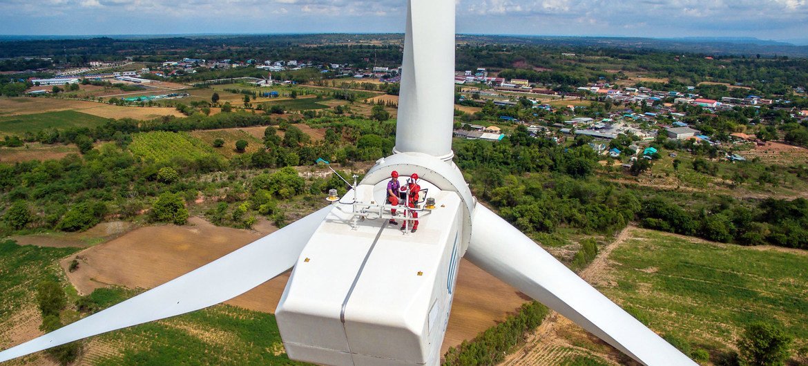 Workers on a wind turbine in Chaiyaphum province, Thailand.