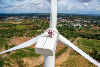 Workers on a wind turbine in Chaiyaphum province, Thailand.
