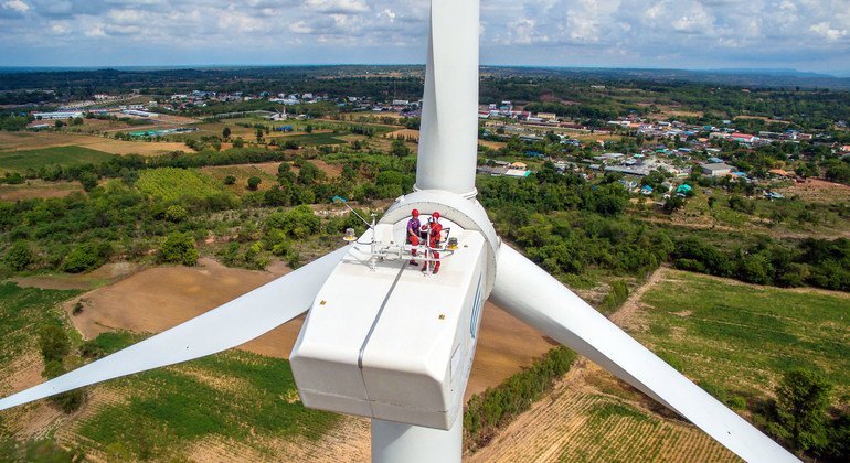 Workers on a wind turbine in Chaiyaphum province, Thailand.
