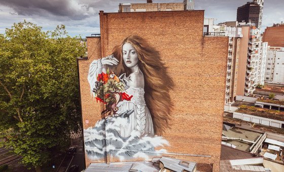 The Alchemist is a 40-metre-high mural which has been painted onto the side of a property in Brussels.