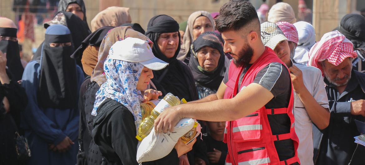 The UN World Food Programme (WFP) distributes food rations to displaced families from Lebanon.