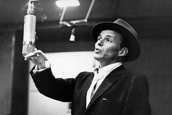 Publicity photo of Frank Sinatra recording at Capitol Studios.
