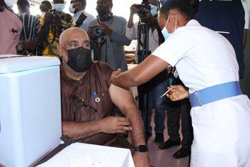 The UN Resident Coordinator in Ghana, Charles Abani, receives a COVID-19 vaccination (file)