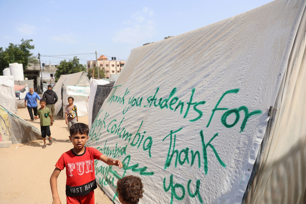 A message of thanks to students around the world protesting events in Gaza is displayed on a tent in the south of the enclave.