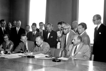 Twelve nations signed the landmark Refugee Convention in 1951, but who is the only woman at the table? (file)