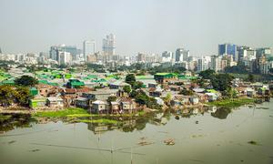 Developing countries like Bangladesh (pictured) spend large amounts of money servicing international debt, diverting vital resources away from development efforts.