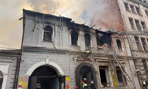 Firefighters tackle a blaze at a building hosting a kindergarten in Kharkiv, Ukraine.