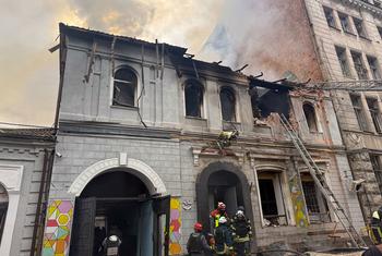Firefighters tackle a blaze at a building hosting a kindergarten in Kharkiv, Ukraine.