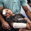 Five-year-old Ayman Abu Hujair receives treatment after an airstrike at Gaza's Al-Hasayneh School (file, May 2025)