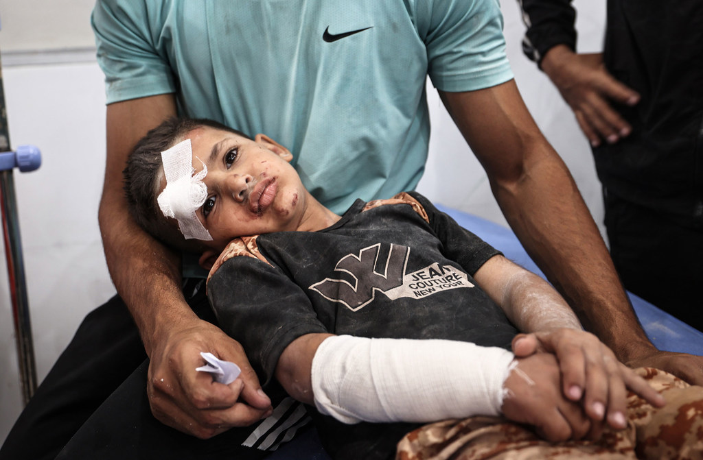Five-year-old Ayman Abu Hujair receives treatment after an airstrike at Gaza's Al-Hasayneh School (file, May 2025)