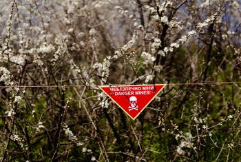 A sign warning of landmines in Ukraine.