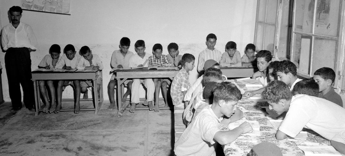 Children attend class at a UNRWA-supported school in the Gaza Strip in 1954. (file)