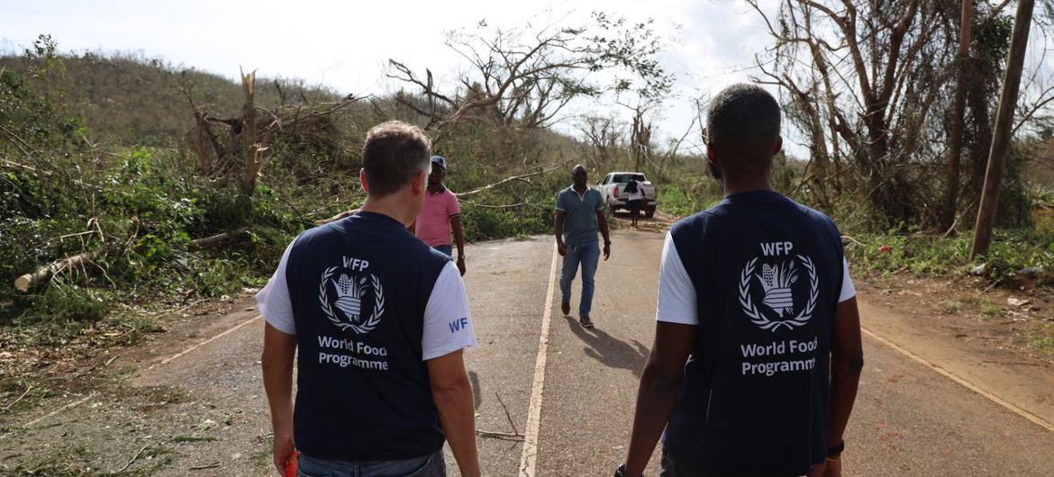 Two staff of the World Food Programme assess the logistical challenges of getting aid to isolated communities in Jamaica. Two staff of the World Food Programme assess the logistical challenges of getting aid to isolated communities in Jamaica.
