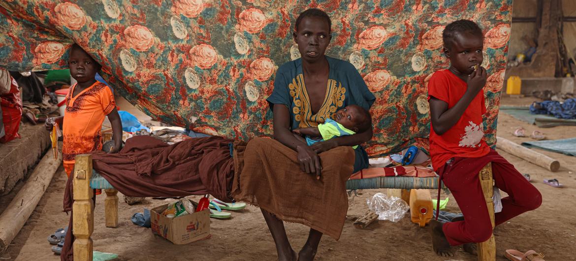 Sudanese refugee Triza, 32, sits in her shelter at the Kurmuk transit centre in the Benishangul-Gumuz region of northwestern Ethiopia.