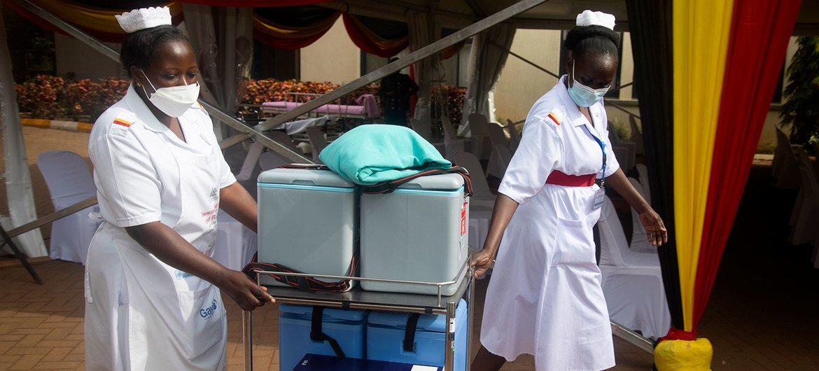 In Uganda, vaccines are being delivered to remote areas on foot, boats and motorcycles.