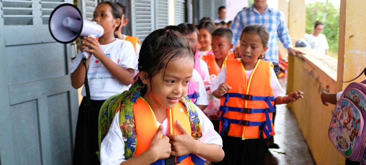 Students take part in a safety evacuation drill in the coastal province of Koh Kong, Cambodia.