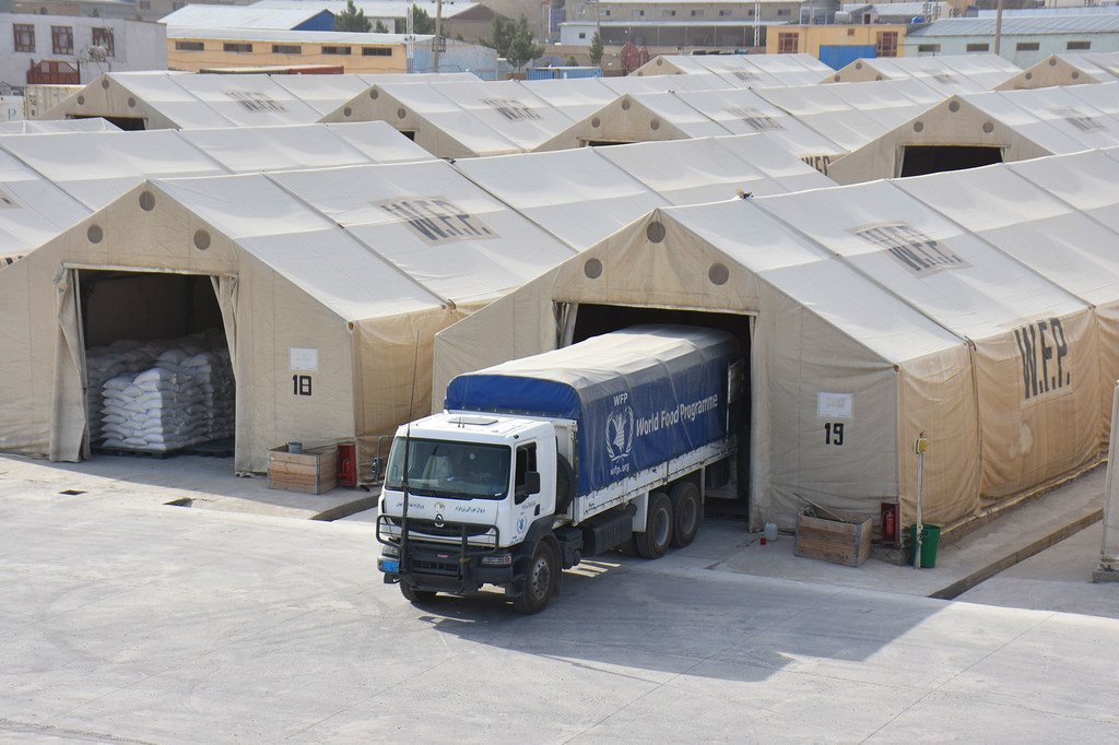 A World Food Programme truck is parked at a WFP warehouse in Afghanistan, loaded with relief supplies.