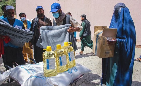 Food and blankets are handed out to people in need in Kabul, the capital of Afghanistan