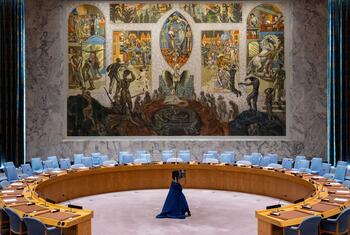The Security Council Chamber of the United Nations, featuring a large mural by Norwegian artist Per Krohg depicting a phoenix rising from ashes of war and slavery into a peaceful world, donated in 1952.