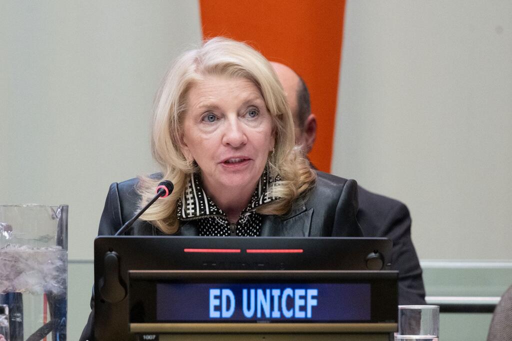 Catherine Russell, Executive Director of UNICEF, speaking at a podium during an informal meeting of the General Assembly plenary regarding the UN80 Initiative.