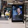 Общественная автобусная остановка в Казахстане с рекламой безопасности дорожного движения с актером Майкла Фассбендером.