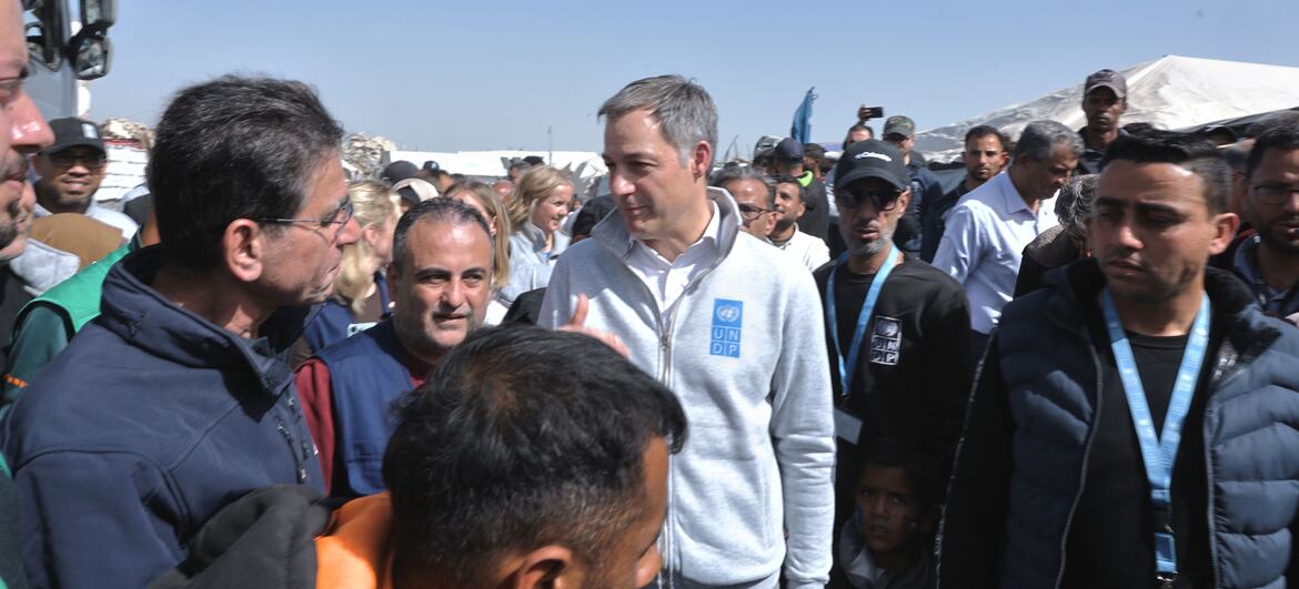Alexander De Croo, Administrator of UNDP, meets with displaced families in Gaza during a field visit, discussing relief and reconstruction efforts.