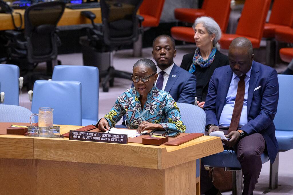 A UN Security Council meeting on the Sudan and South Sudan, featuring a woman speaking at a desk with a nameplate identifying her as the Special Representative of the Secretary-General and Head of the United Nations Mission in South Sudan, with three other officials seated behind her.