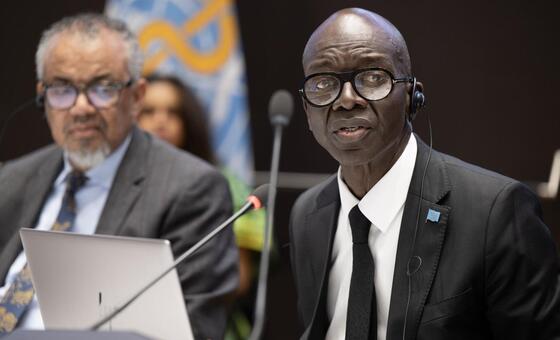WHO Director-General Tedros Adhanom Ghebreyesus and Dr. Mawete Janabi speaking at a press conference.