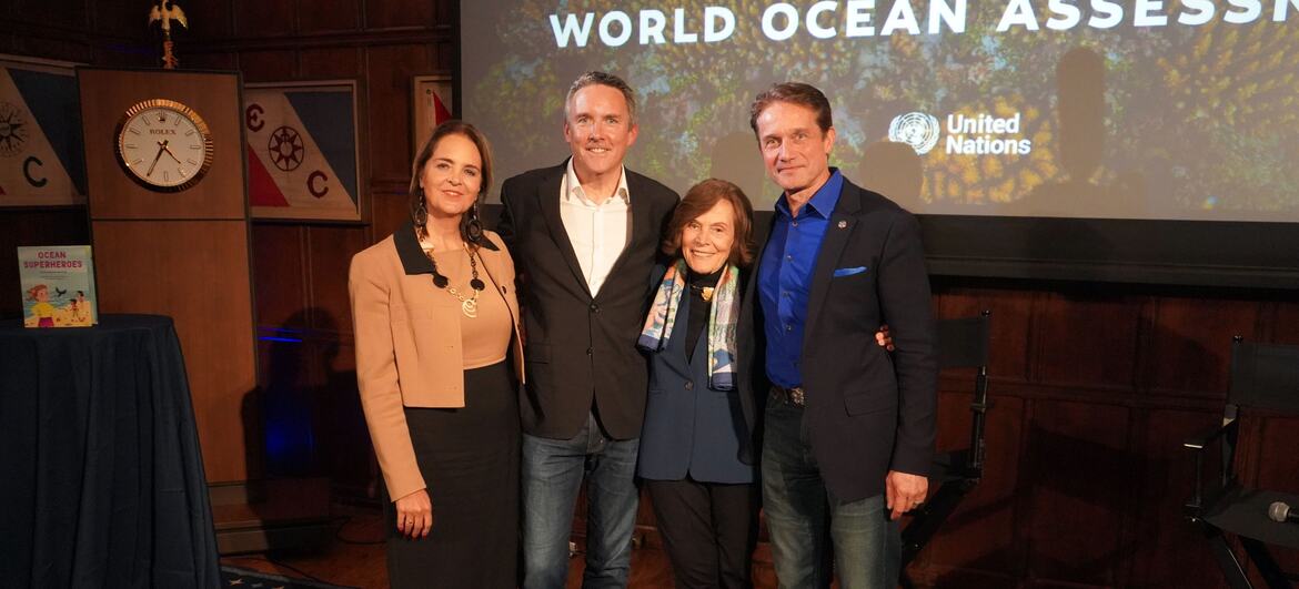Four individuals, including Ms. Bahia Tahzib, Richard Vevers, Sylvia Earle, and Fabien Cousteau, posing for a photo at the Explorers Club in New York City.
