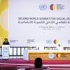 A woman speaks at a podium during the Second World Summit for Social Development plenary session in Doha, Qatar, in November 2025.