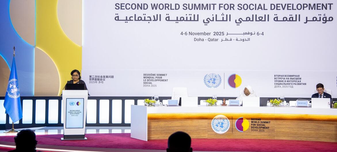 A woman speaks at a podium during the Second World Summit for Social Development plenary session in Doha, Qatar, in November 2025.