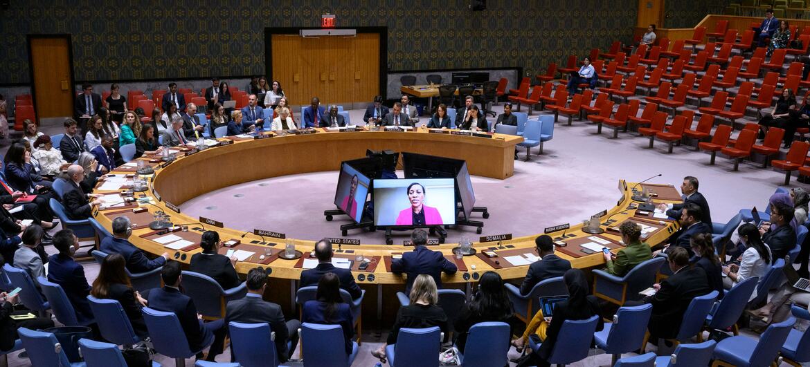UN Secretary-General Edem Wosornu speaks on a screen during a UN Security Council meeting in New York on the situation in Afghanistan.
