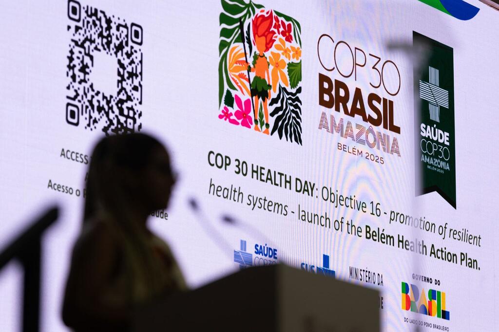 A speaker at a podium during the COP 30 Health Day launch of the Belém Health Action Plan in Belém, Brazil.