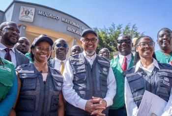 WHO Director-General Dr Tedros Adhanom Ghebreyesus poses for a photo with health workers and officials at Mulago National Referral Hospital in Uganda.