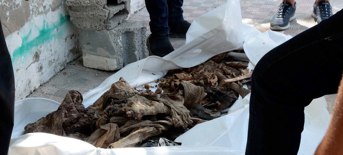 The remains of several members of Ramez Nabhan's family, after local teams managed to recover them from beneath the rubble.
