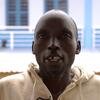 Justin Singo Nguma, un survivant d'Ebola, est représenté sur un portrait.