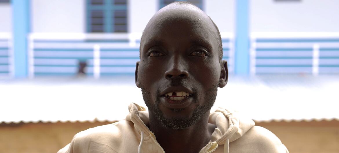 Justin Singo Nguma, un survivant d'Ebola, est représenté sur un portrait.