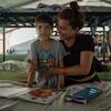 Enni y su hijo, Moisés, son supervivientes de los terremotos en La Guaira y se refugian en uno de los 107 campamentos temporales instalados en Venezuela.