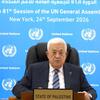 President Mahmoud Abbas of the State of Palestine addresses the UN General Assembly from a podium in New York, with the Palestinian flag visible to his left.