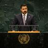 Iraqi Prime Minister Ali Falih Al-Zaidi speaks at a podium bearing the United Nations emblem during the General Debate of the UN General Assembly’s 81st session.