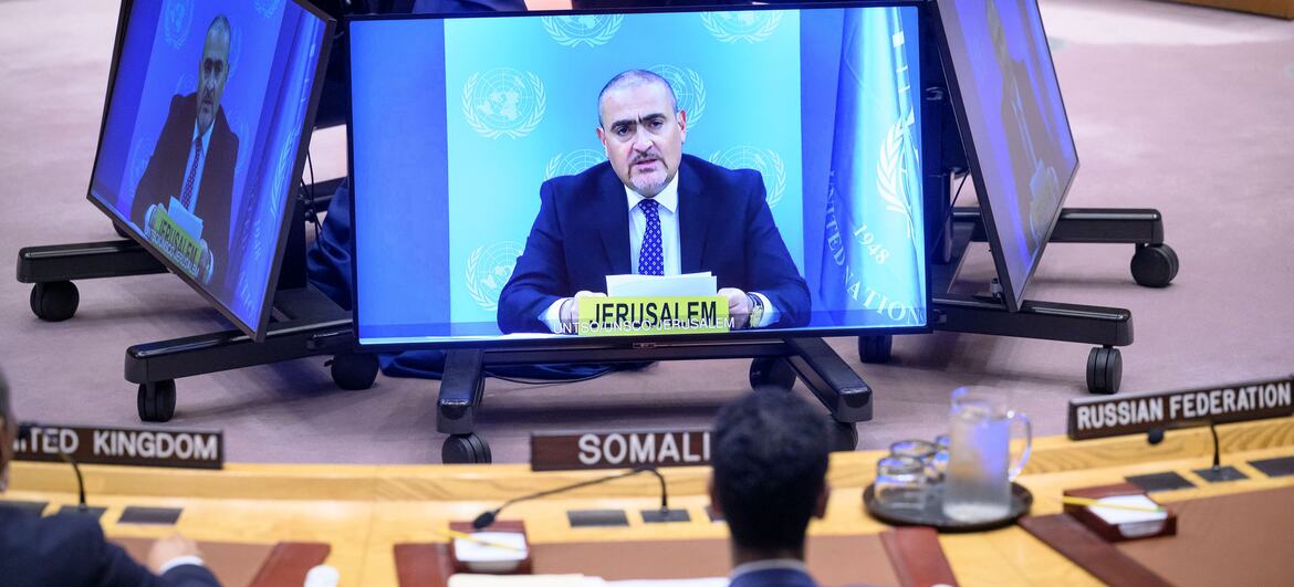 Ramiz Alakbarov appears on a large screen during a UN Security Council meeting in New York, briefs on the Middle East situation.