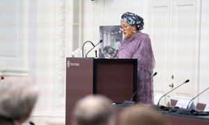 Amina Mohammed, UN Deputy Secretary-General, delivering a speech at Folketinget in Denmark, advocating for global peace, sustainable development, and protection of the UN Charter.