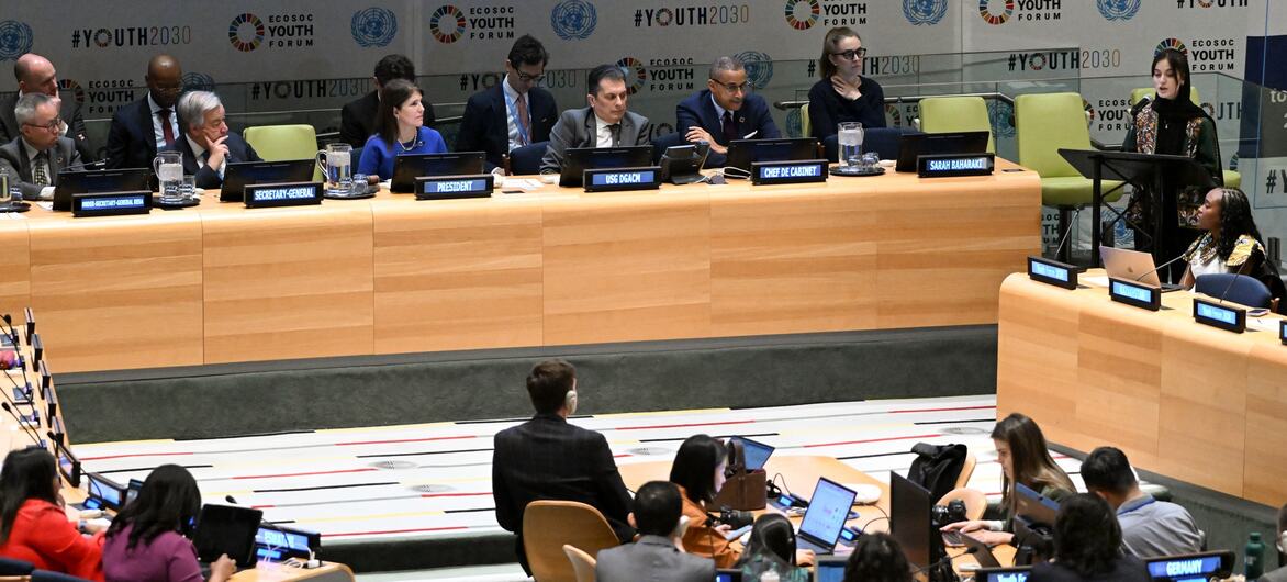 A formal meeting at the United Nations Economic and Social Council Youth Forum 2024, with officials including Secretary-General António Guterres seated at the dais and youth speakers at the podium.