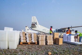 MINUSCA personnel prepare electoral supplies, including boxes and plastic weather proof containers, for transport onboard mission aircrafts as the Central African Republic heads to polls on 28 December 2025.